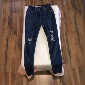 Levi’s high-rise skinny jeans, size 26,.